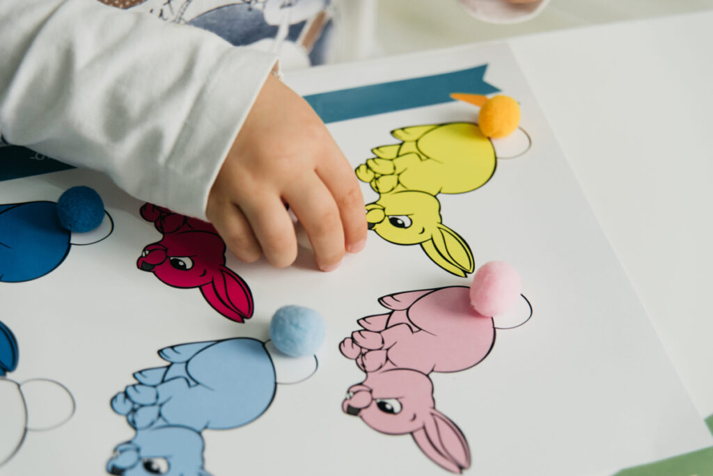 Close up of child hands playing