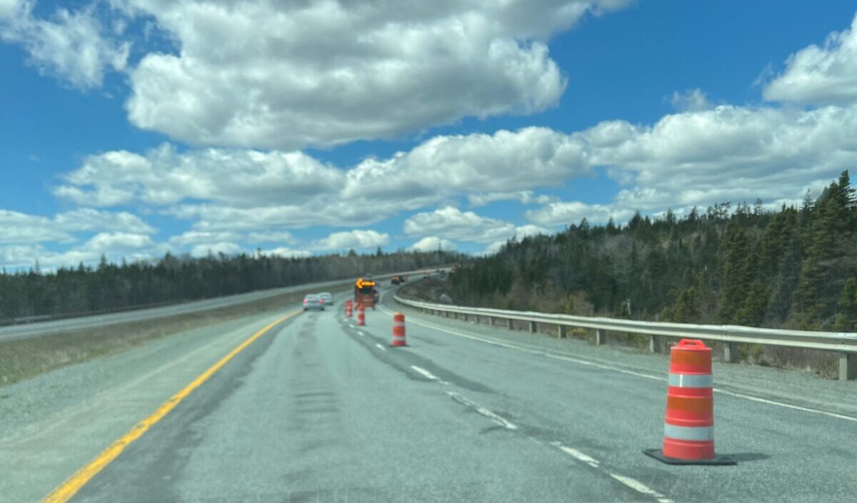 Highway pavement with traffic cones