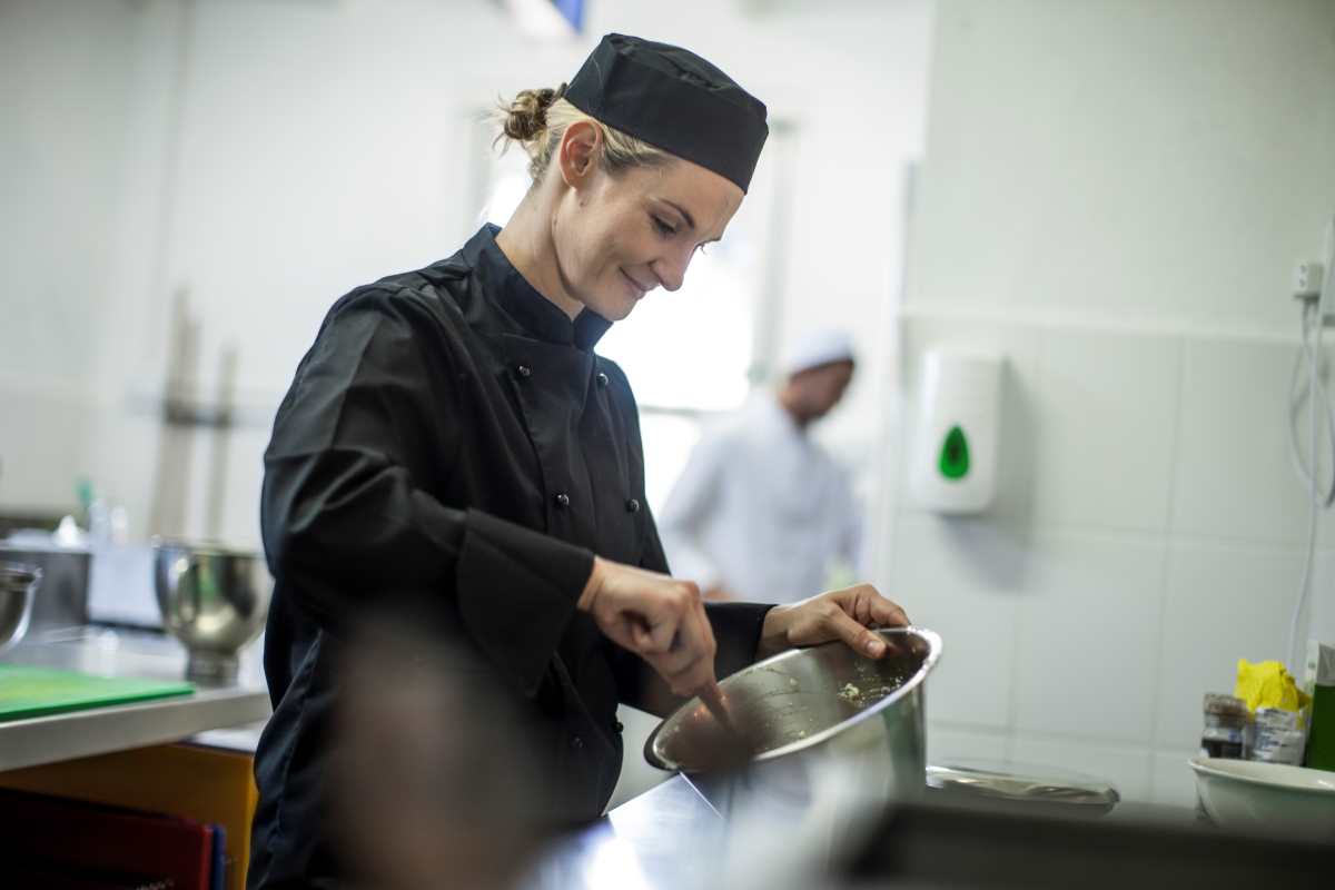chef preparing food in kitchen