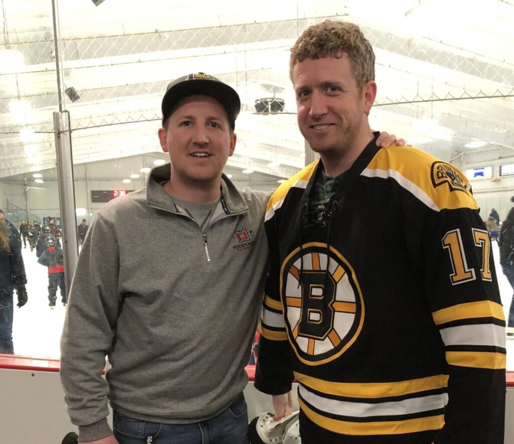 Iain standing with Ben